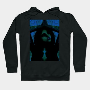 Portrait, digital collage, special processing. Beautiful but dark, like witch, woman. Tale. Blue, green and dim. Hoodie